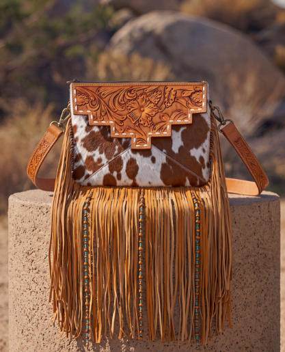 The Design Edge Machala – Tooling Leather Cowhide Sling Bag with Fringes and Buckstitch
